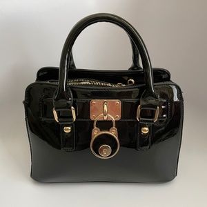 Small black glossy purse